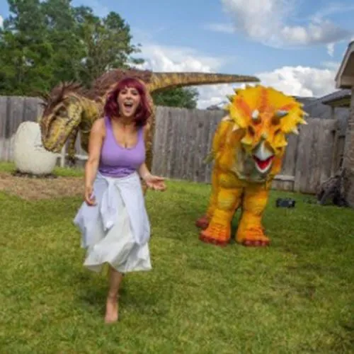 Esistono costumi da dinosauro per bambini con un colore neon?